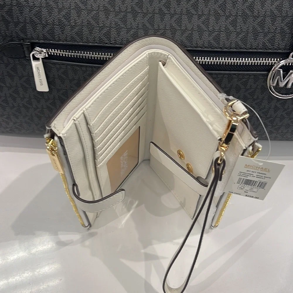 MICHAEL KORS LARGE DOUBLE ZIP WRISTLET WALLET PHONE CASE CLUTCH
Optic White - Picture 12 of 16